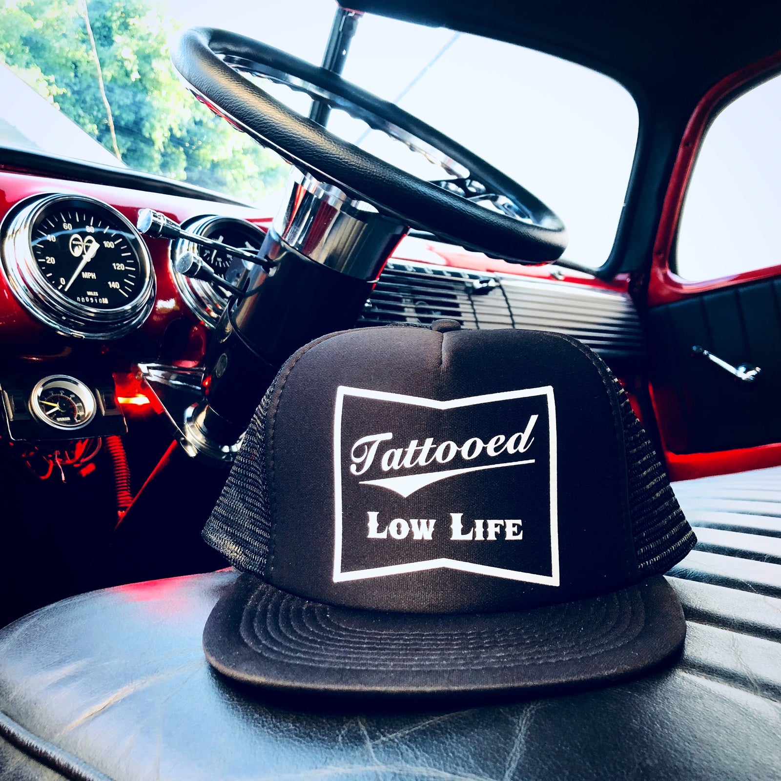 Tattooed Low Life Trucker Hat Cartel Ink